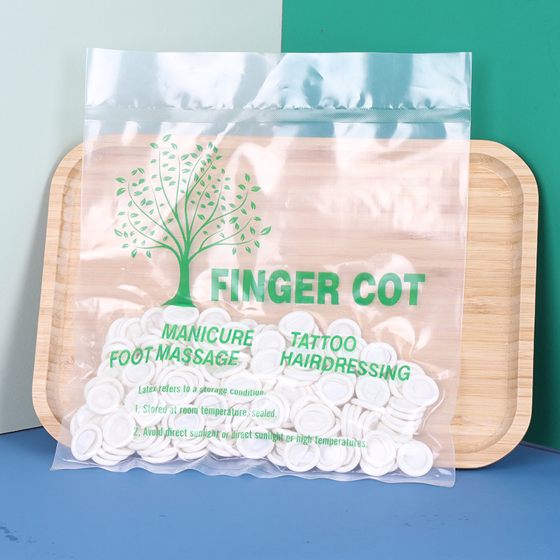 一次性乳膠手指套無(wú)粉無(wú)塵白色手指套 防護(hù)手指套.jpg